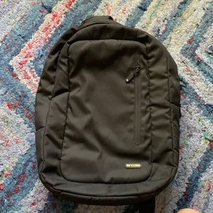 Black crossbody backpack
